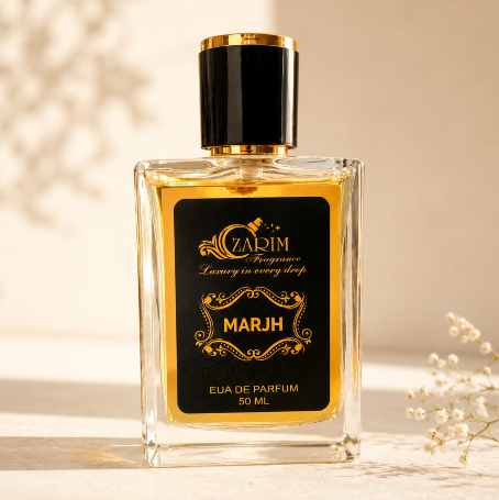 Perfume bottle with gold and black design on a beige background