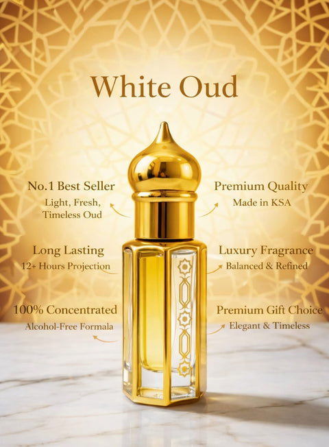 Gold and glass perfume bottle labeled 'White Oud' on a decorative background