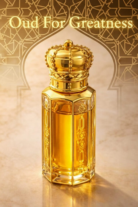 Gold perfume bottle with intricate design on a textured beige background, featuring the text 'Oud For Greatness'.